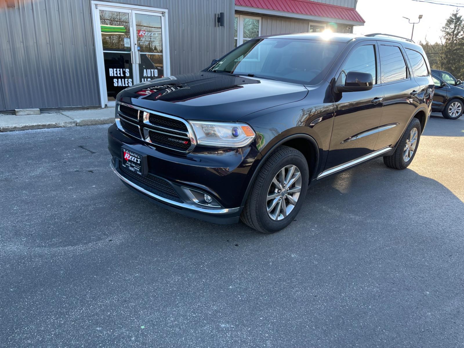 2018 Purple /Black Dodge Durango SXT Plus AWD (1C4RDJAG4JC) with an 3.6L V6 DOHC 24V engine, 8A transmission, located at 547 E. Main St., Orwell, OH, 44076, (440) 437-5893, 41.535435, -80.847855 - This 2018 Dodge Durango SXT Plus AWD is equipped with a powerful 3.6 Pentastar V6 engine paired with an 8-speed automatic transmission, offering a blend of performance and efficiency. This model features a comfortable interior with a power driver's seat, heated front seats, and a heated steering whe - Photo #0